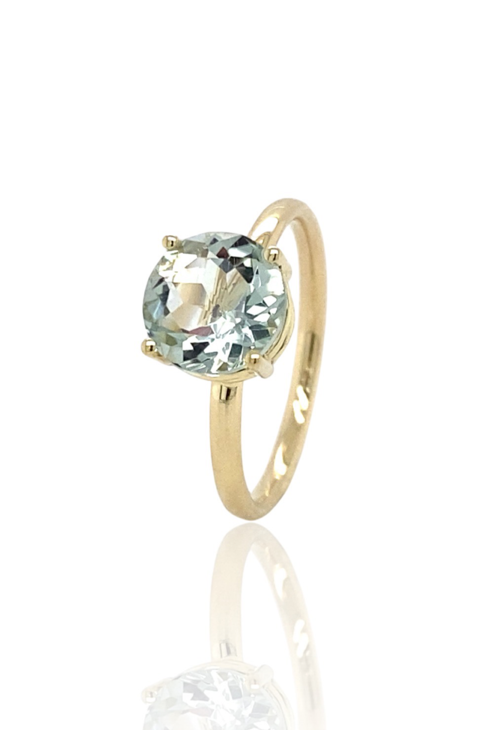 praseolite in gold ring