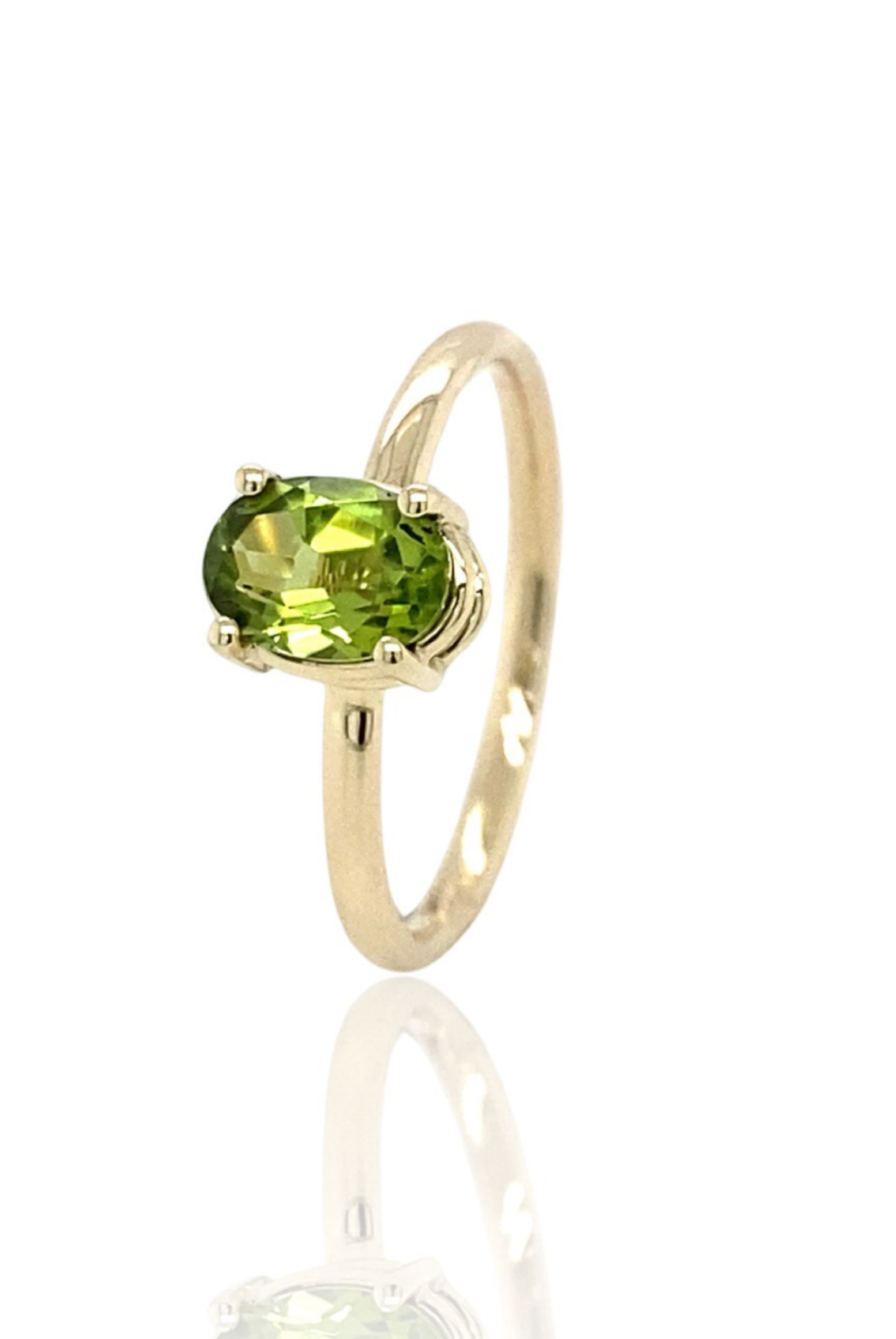 peridot in gold ring