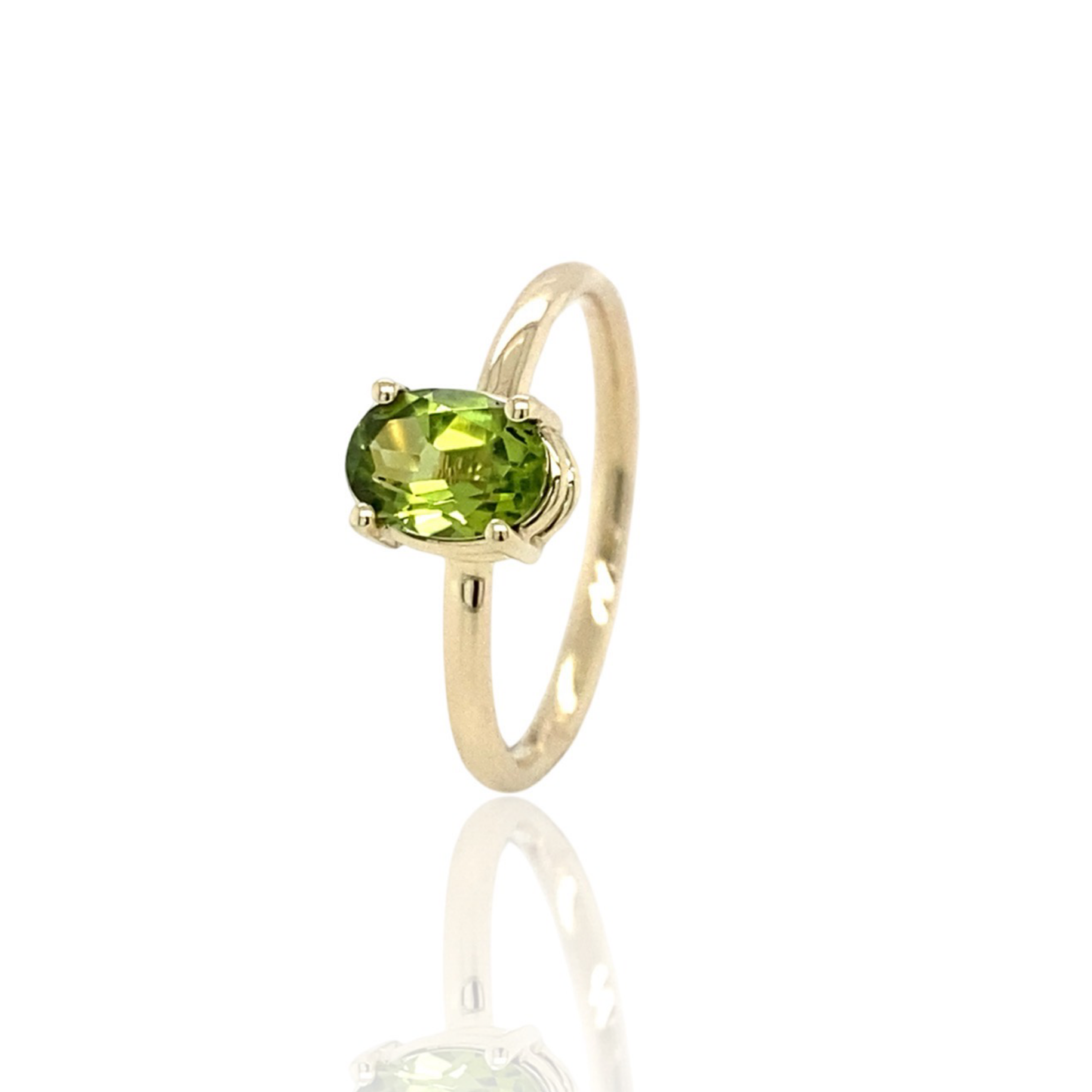 peridot in gold ring