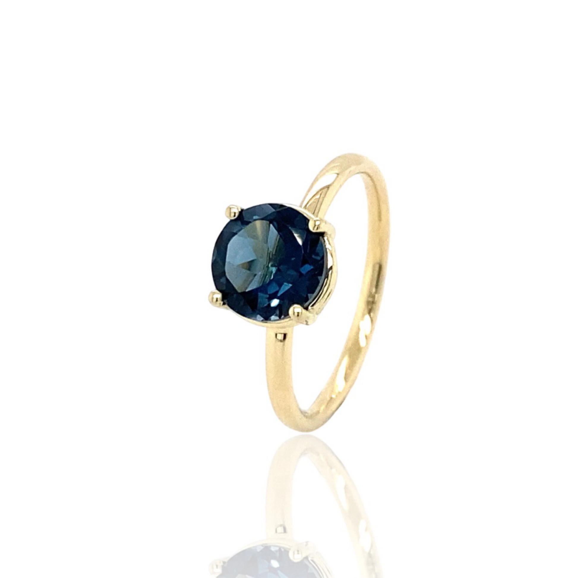 london topaz in gold ring