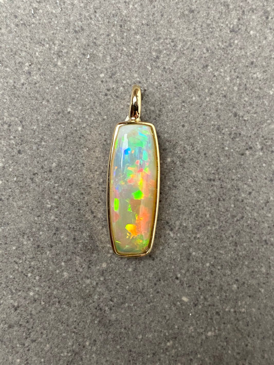 Ethiopian Opal pendant in yellow gold