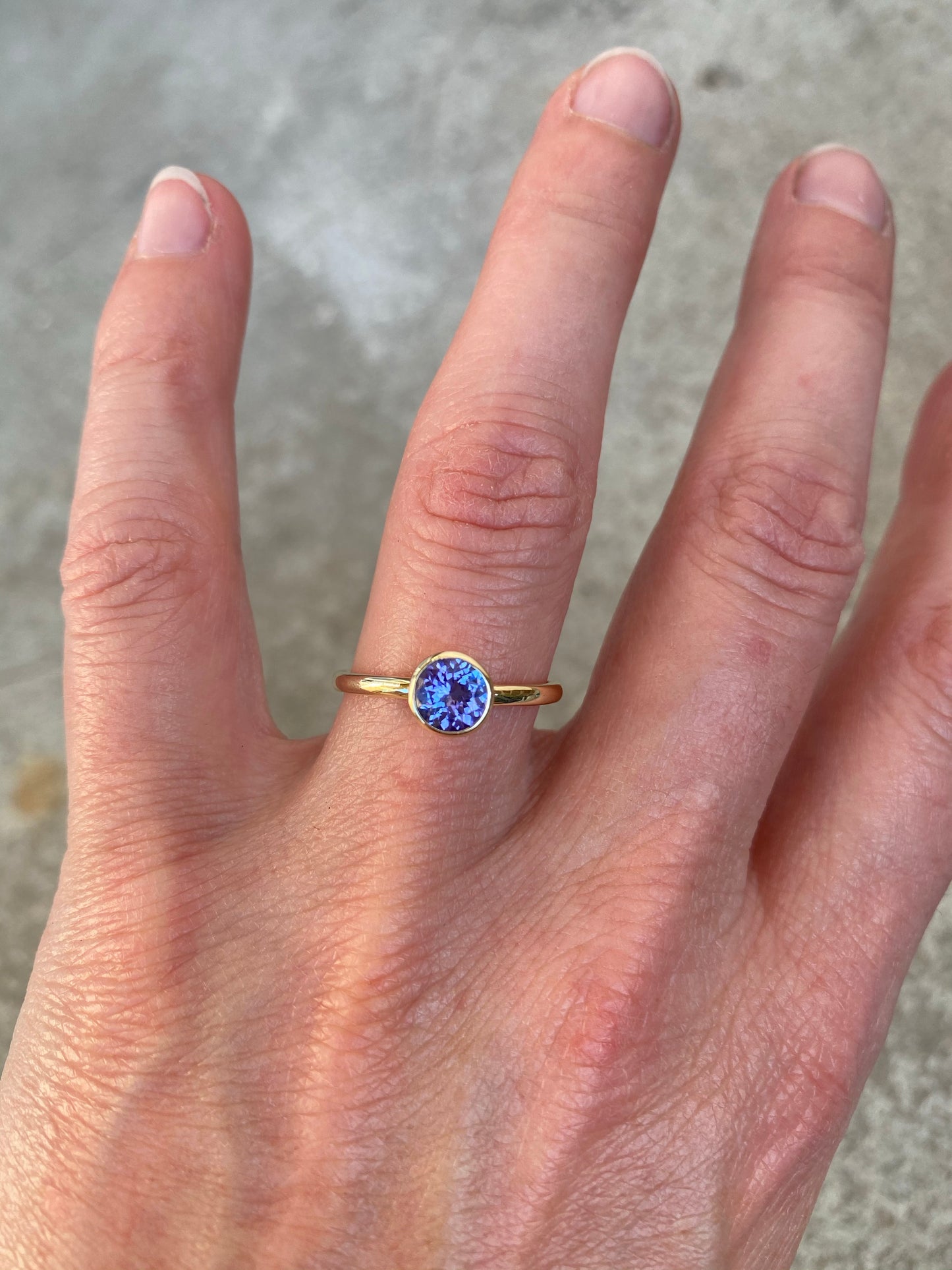 14k yellow gold ring set with a Tanzanite