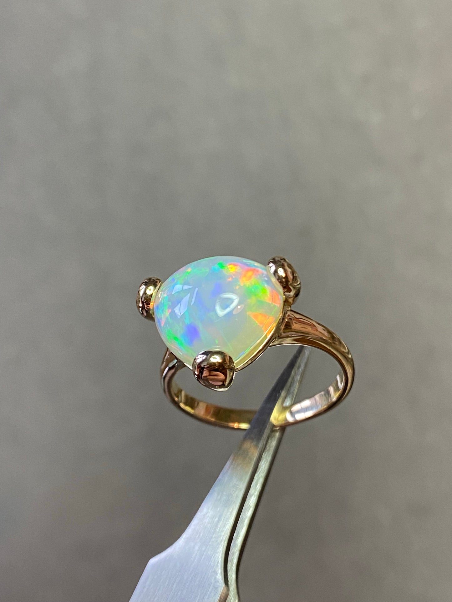18k yellow gold ring set with an Ethiopian opal