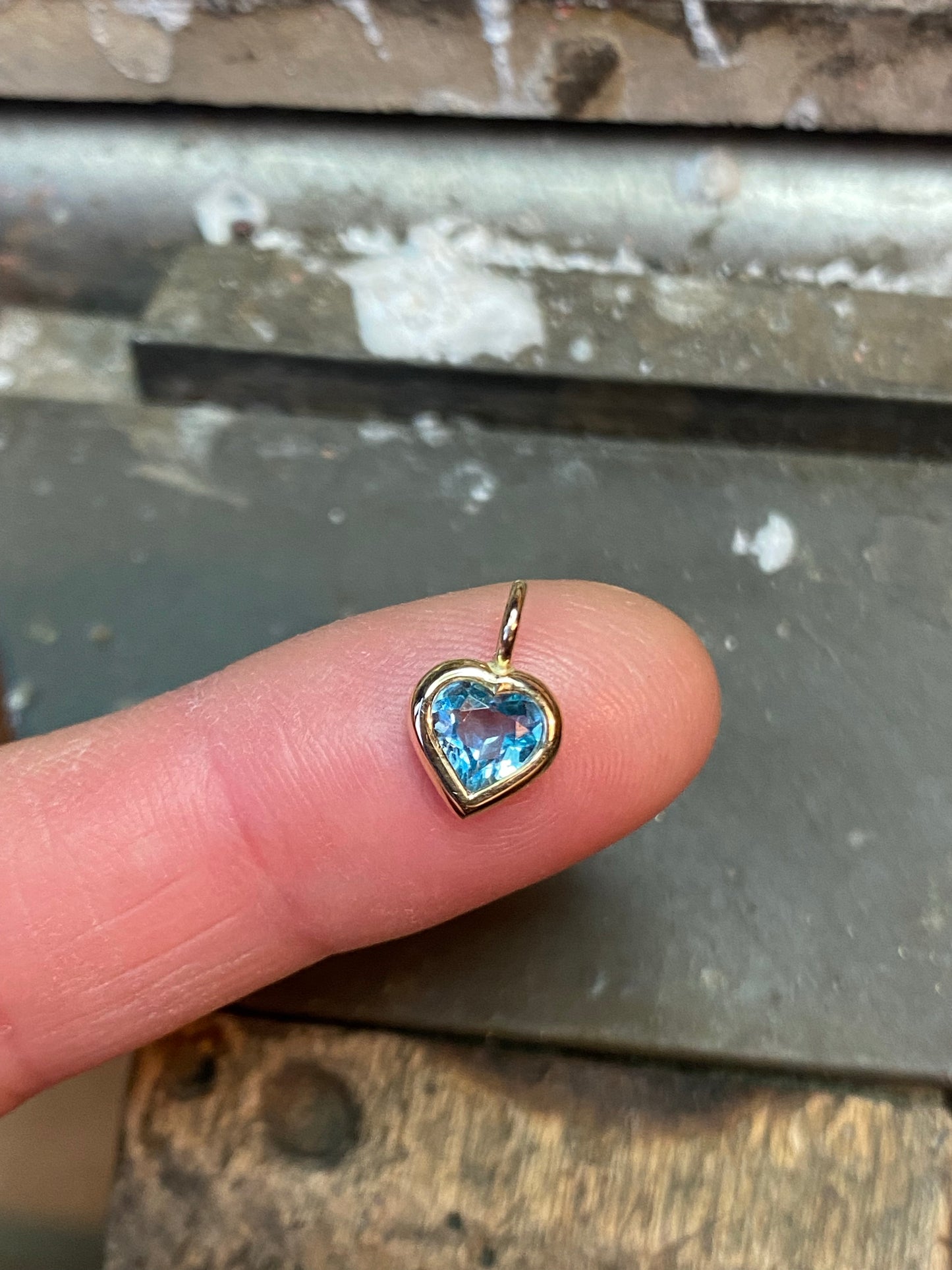 Blue Topaz heart pendant in gold
