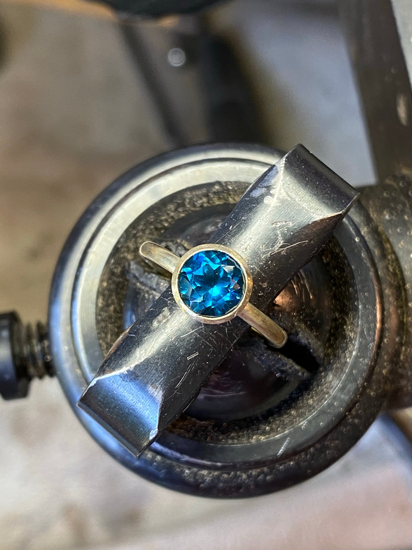14k yellow gold ring set with a london blue topaz