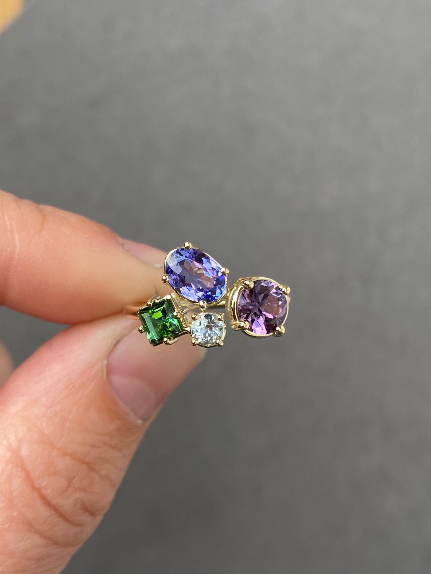 Mosaic ring with Tanzanite, Spinel, Tourmaline and Blue Topaz in 14k yellow gold