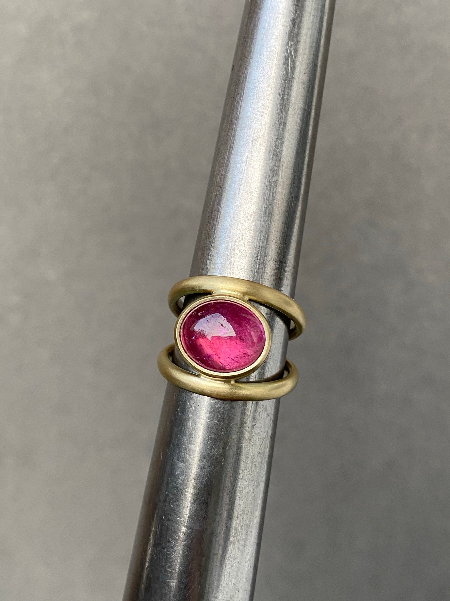 14k yellow gold ring set with a pink tourmaline