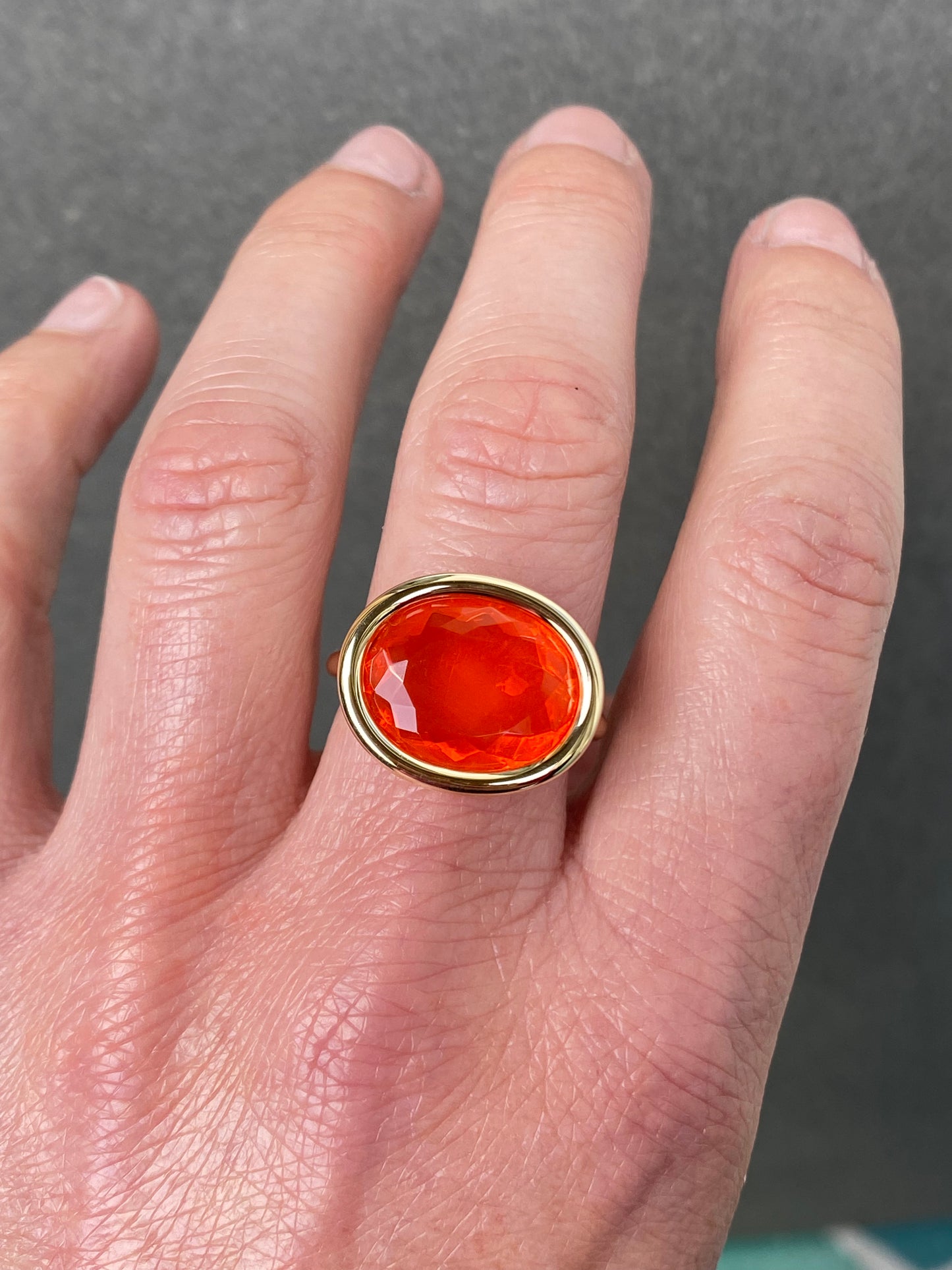 14k yellow gold ring set with an exquisite fire opal