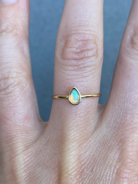 Small drop Opal in 14k yellow gold ring