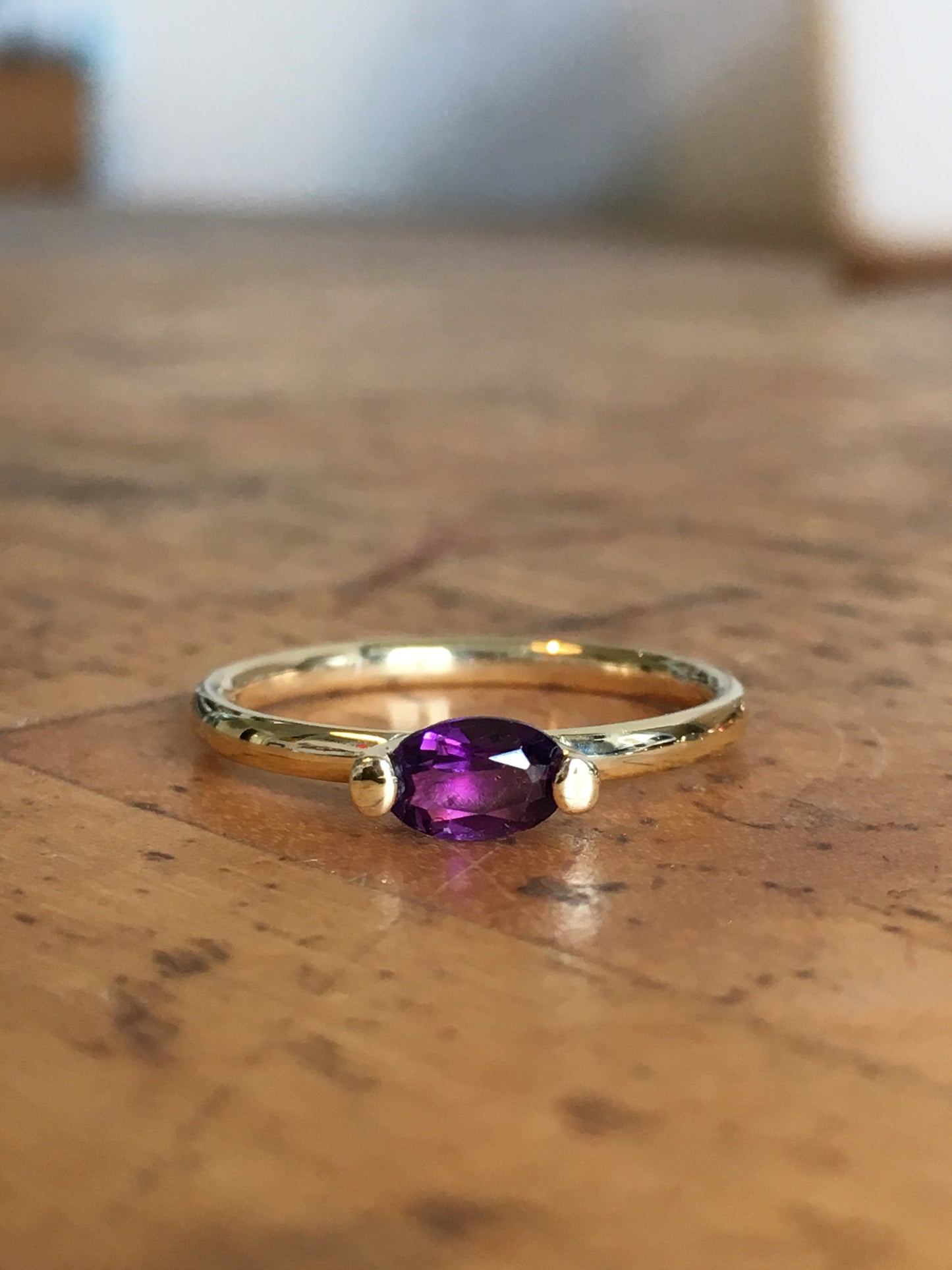 14k yellow gold ring set with an amethyst